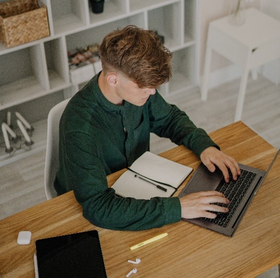 young man at laptop